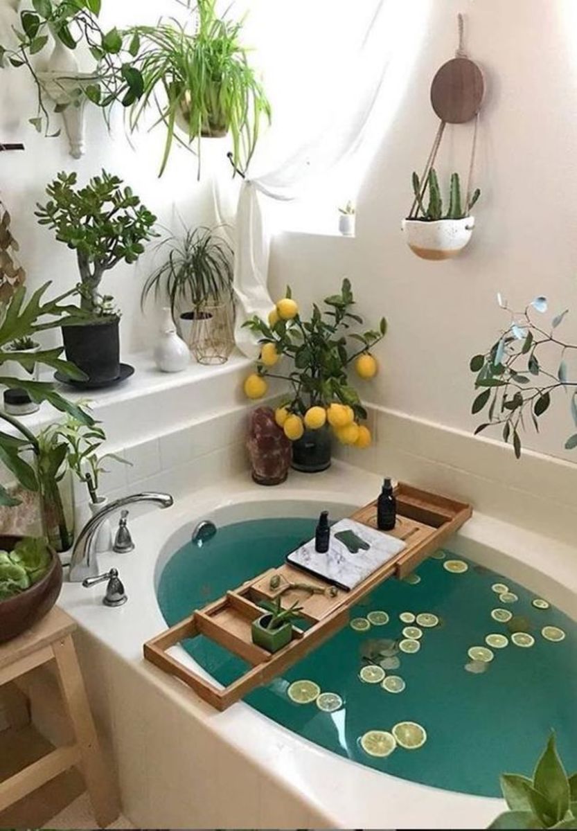 The Chinese Zodiac Rat's bathroom should be about pampering. Water is its favorite element. There should be the scents of flowers, bubbles, citrus, the perfect brushes, the perfect music, and maybe even a glass of wine.
