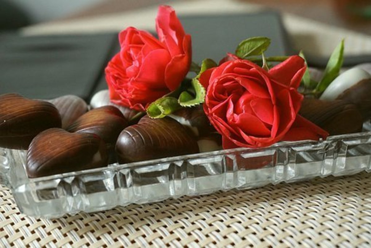 Chocolates And Red Roses 