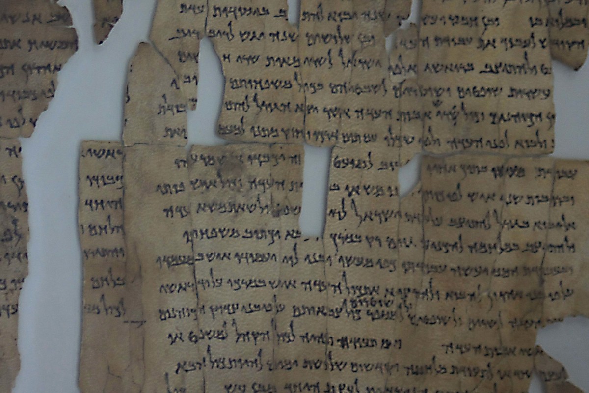 A fragment of just one of the world famous Dead Sea Scrolls - thousands of Biblical and other Hebrew texts mostly written in the 1st and 2nd centuries BC,  hidden long ago in caves in the region of Qumran, and only rediscovered in the 20th century