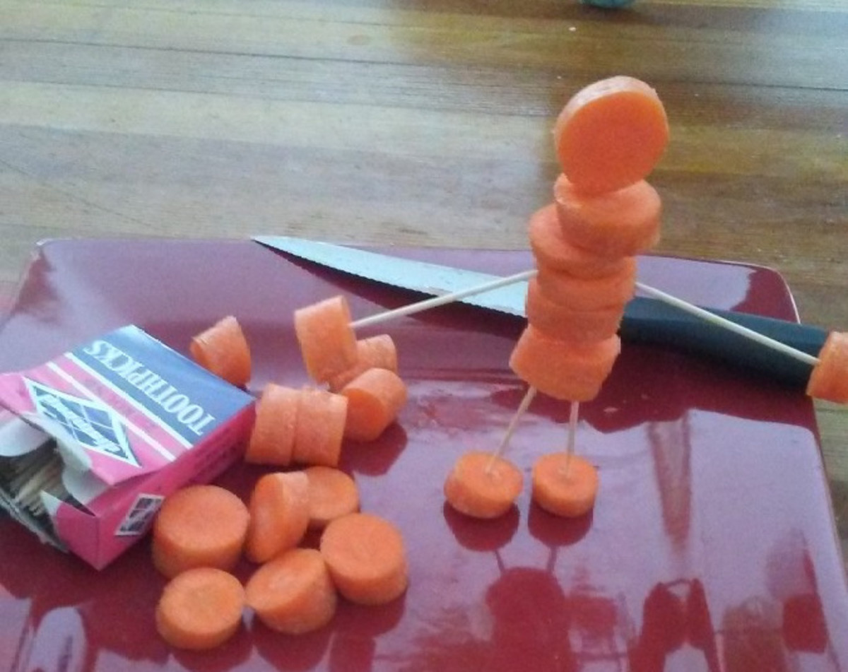 Let your kids get creative by making carrot sculptures. All you need are carrot circles, toothpicks, and a keen imagination.