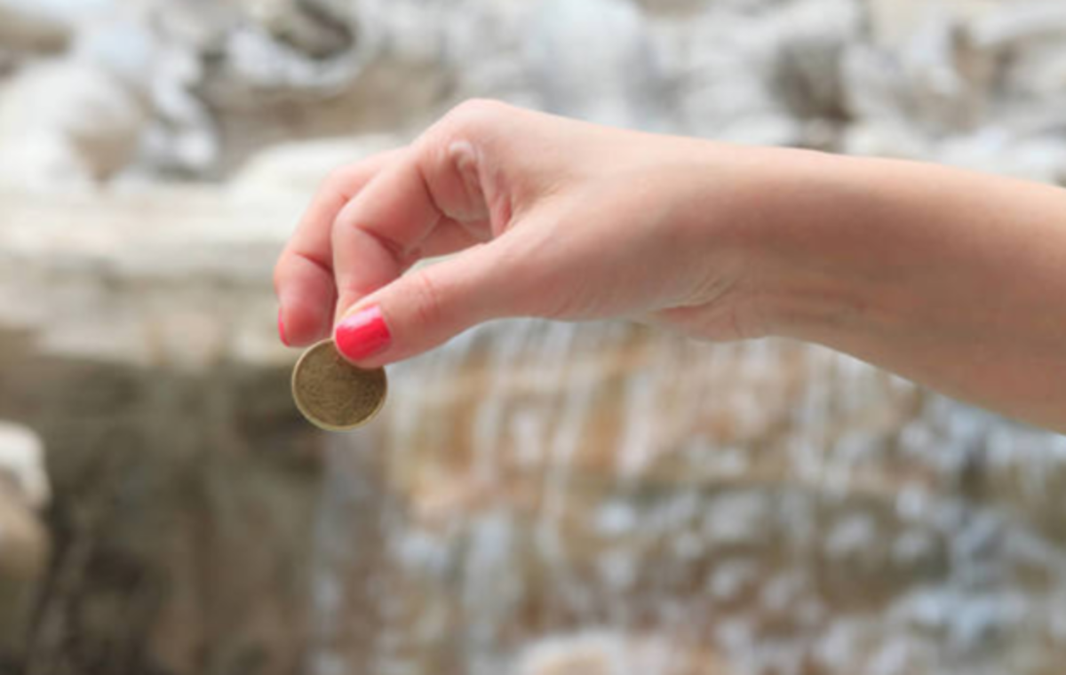 why-do-people-toss-coins-into-a-lake-or-river-or-fountain