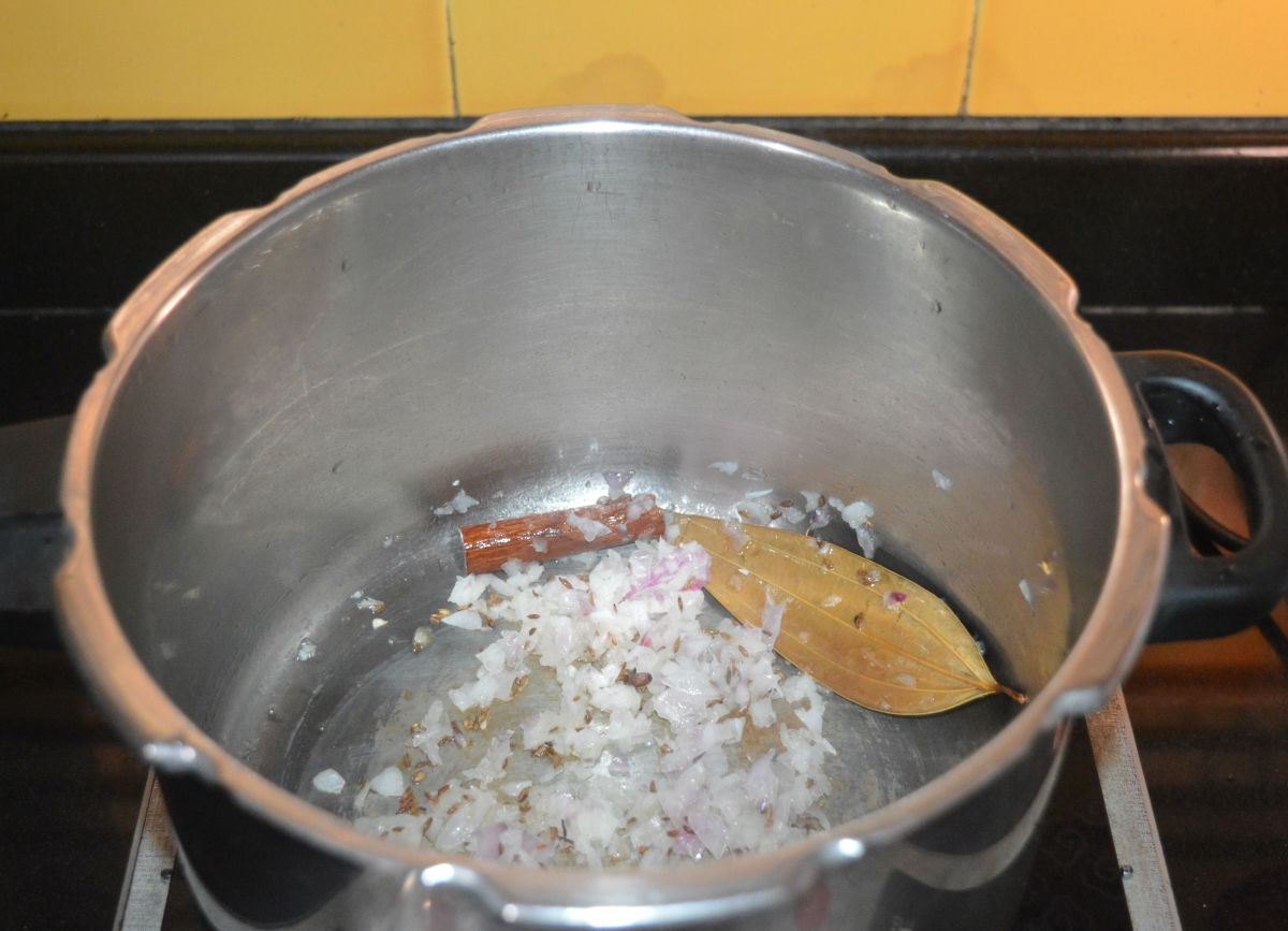 Add chopped onions. Continue to saute until the onions become pinkish and transparent.