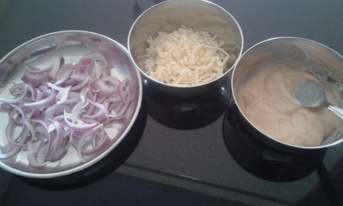 Ingredients for assembling (from right to left): mayonnaise and ketchup mixture, cheese, onion slices