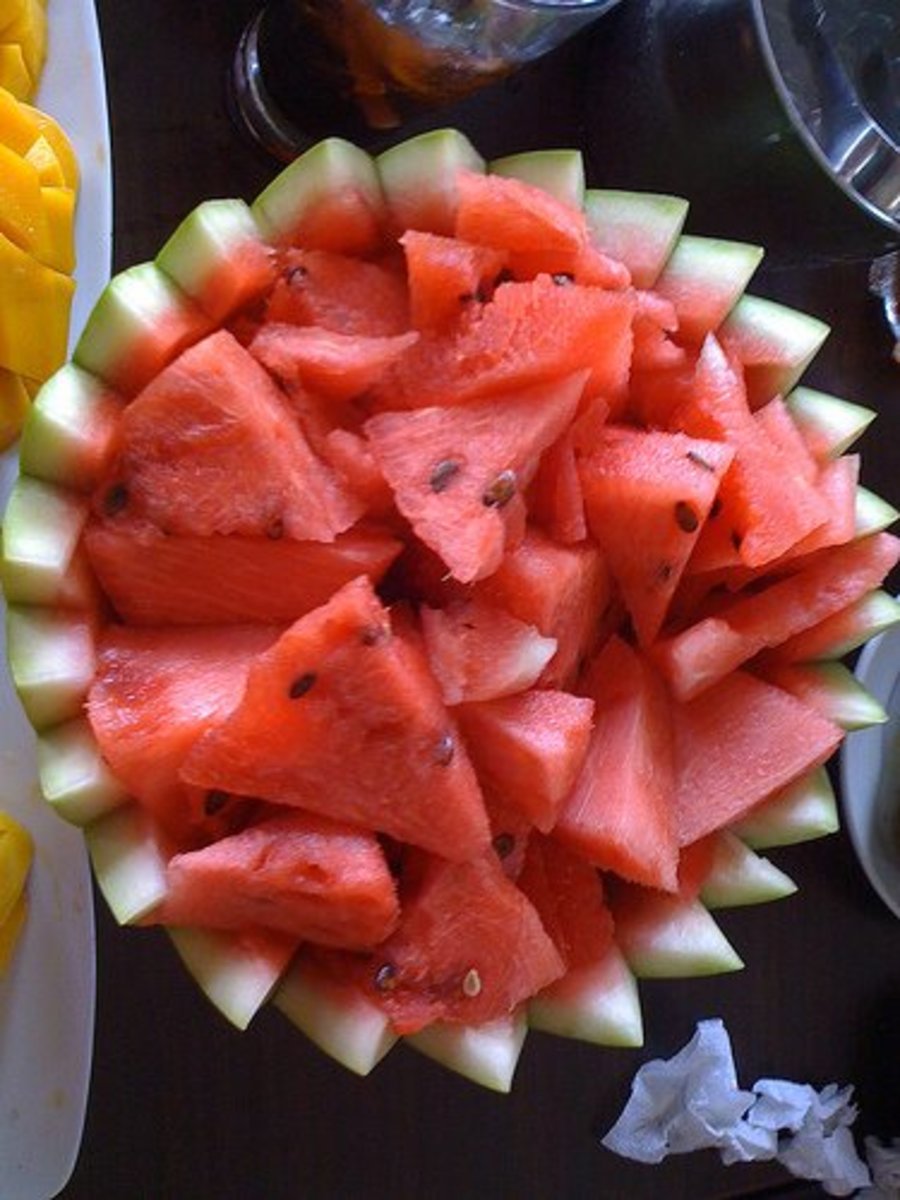 Watermelon bowls make eye-catching centerpieces for summer picnics.