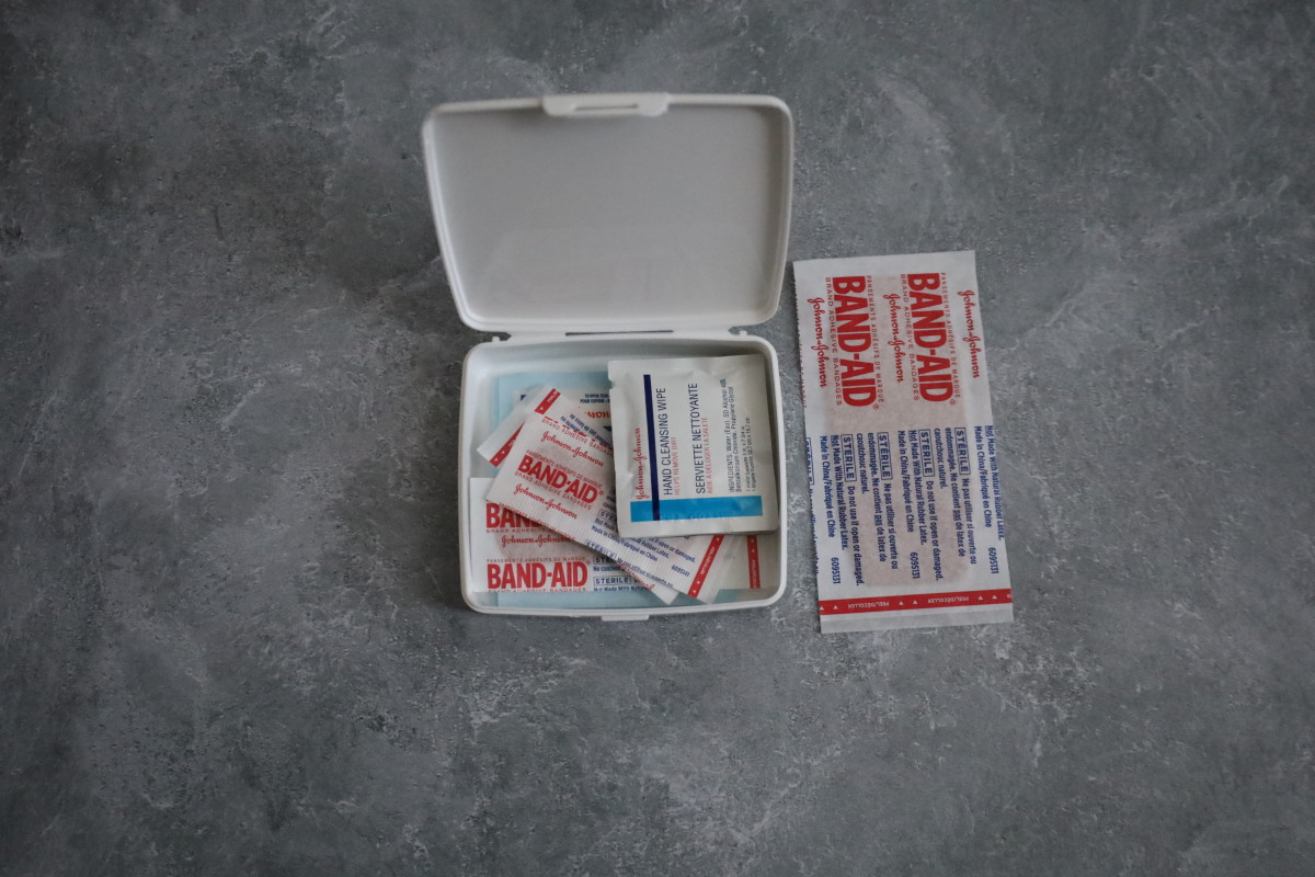 It won't hurt to have bandages and anti-bacterial wipes in the First-Aid Kit. 