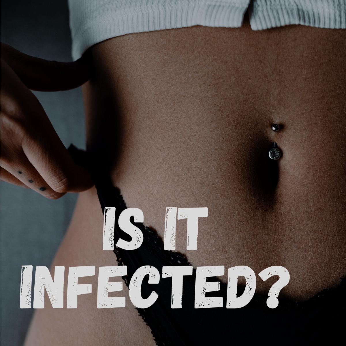 Here's how to tell if your belly button piercing is infected. 