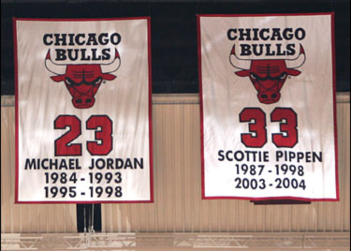 Michael Jordan's and Scottie Pippen's jerseys hanging in the United Center rafters