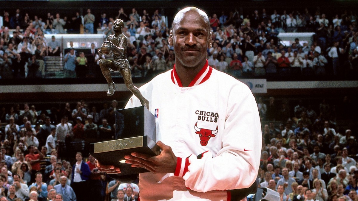 MJ holding a well-deserved MVP award