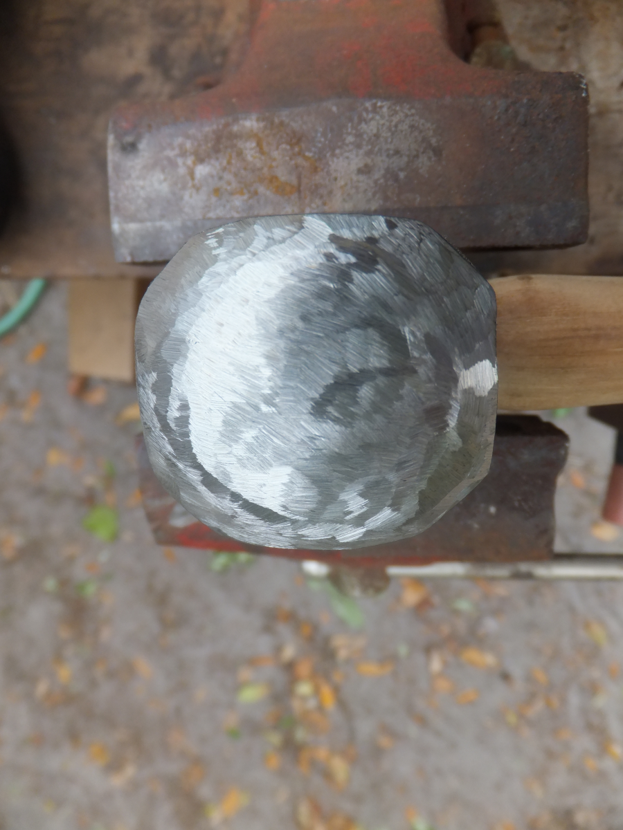 Blacksmith hammer ground with angle grinder, ready for further dressing.