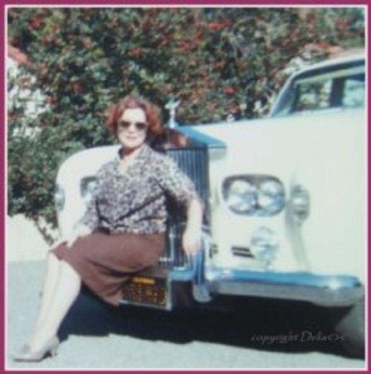 *circa 1963 sitting on the Rolls Royce
