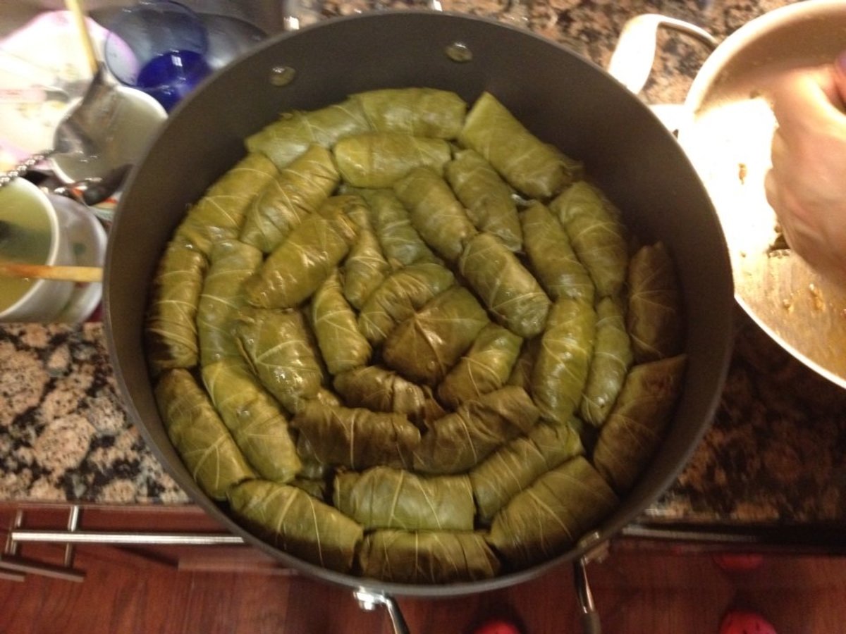 Arrange sarma in circular pot. Make sure to fully cover the base of the pot. Sarma can break during the steaming phase, so pack them in tightly!