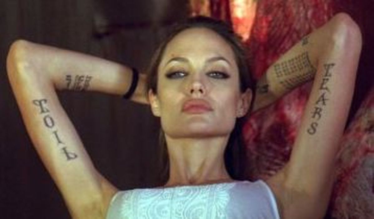 Angelina as Fox in "Wanted." "Toil" and "Tears" are just two of the fake tattoos added for the movie character.