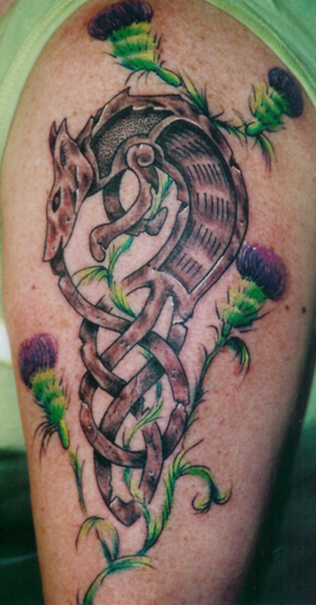 Celtic Wolf Arm Tattoo