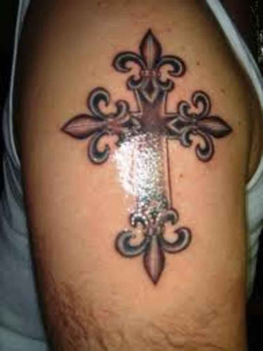 Feminine fleur de lis tattoo