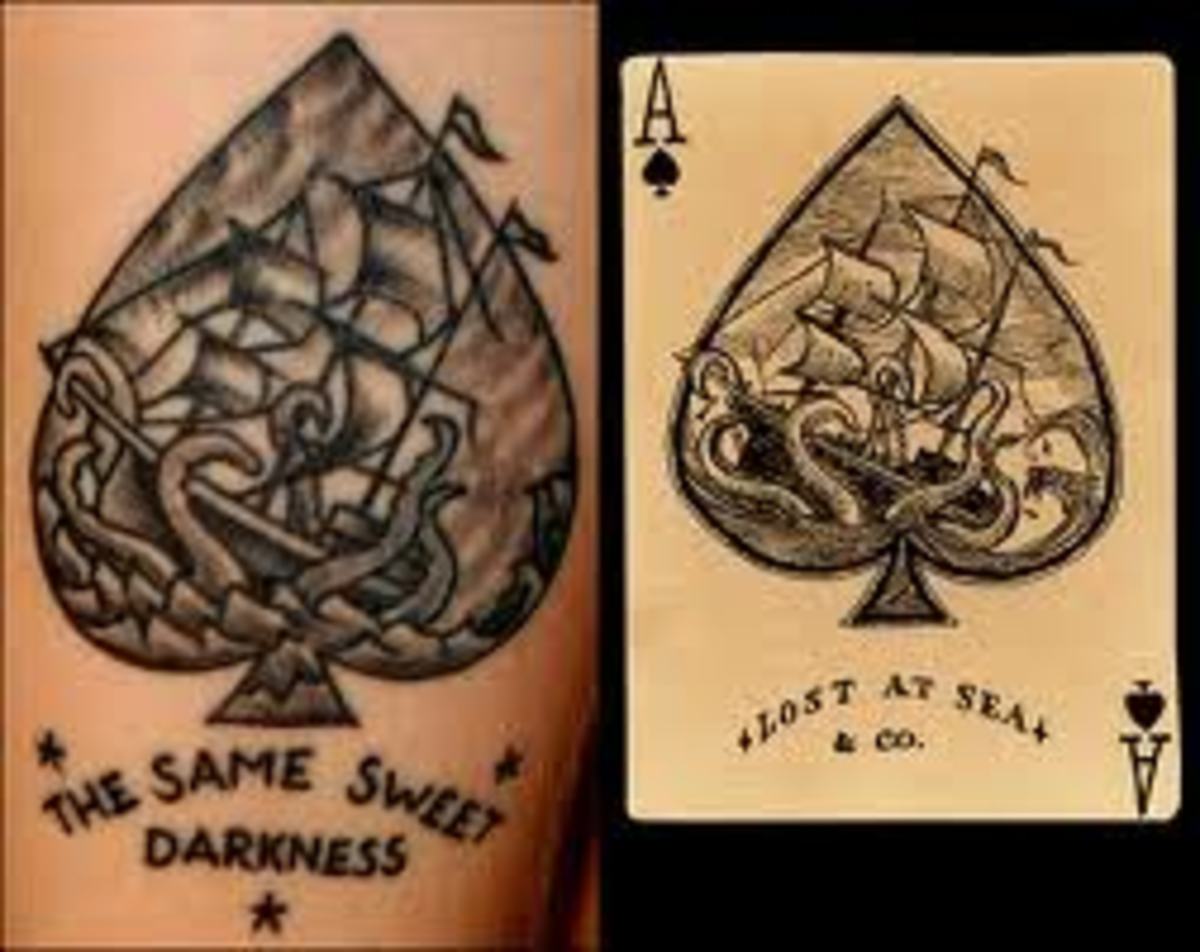 Что значат карты в татуировке
