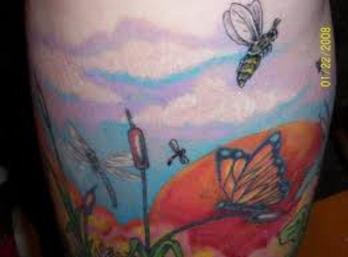 In this tattoo, bees are paired with butterflies and dragonflies.