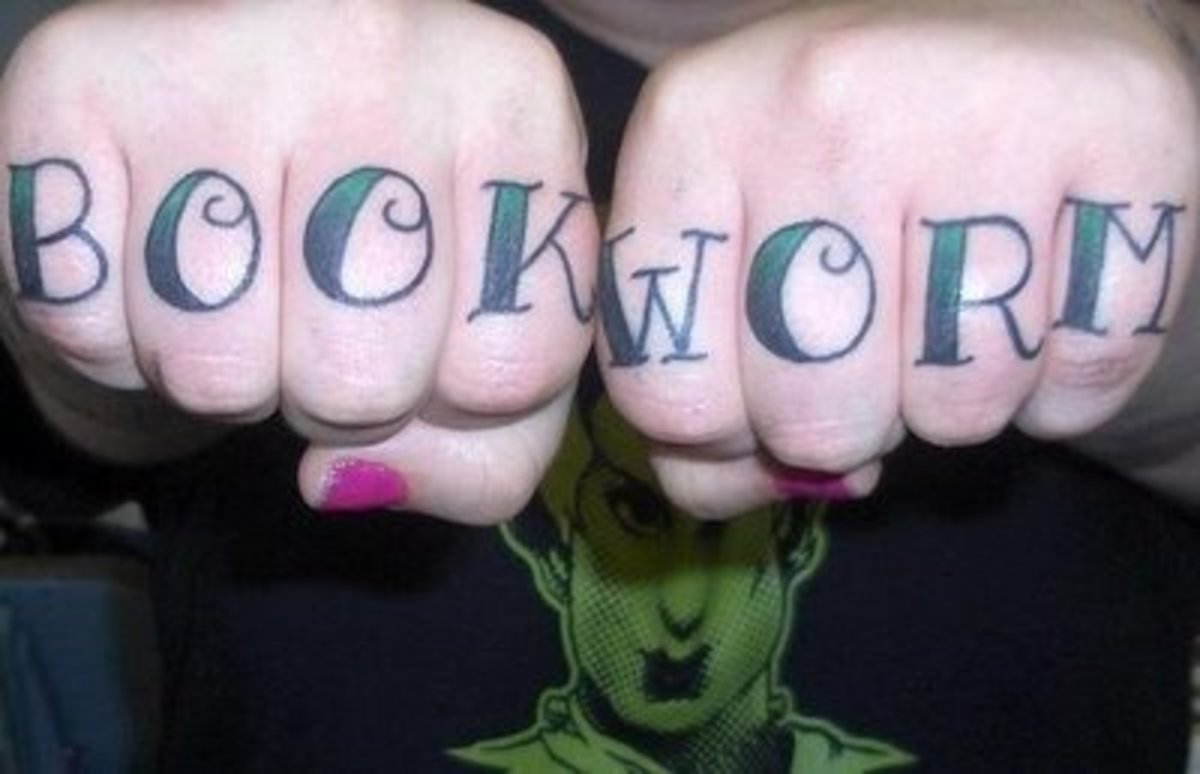 Awesome Bookworm knuckle tatt! Now that's hardcore.