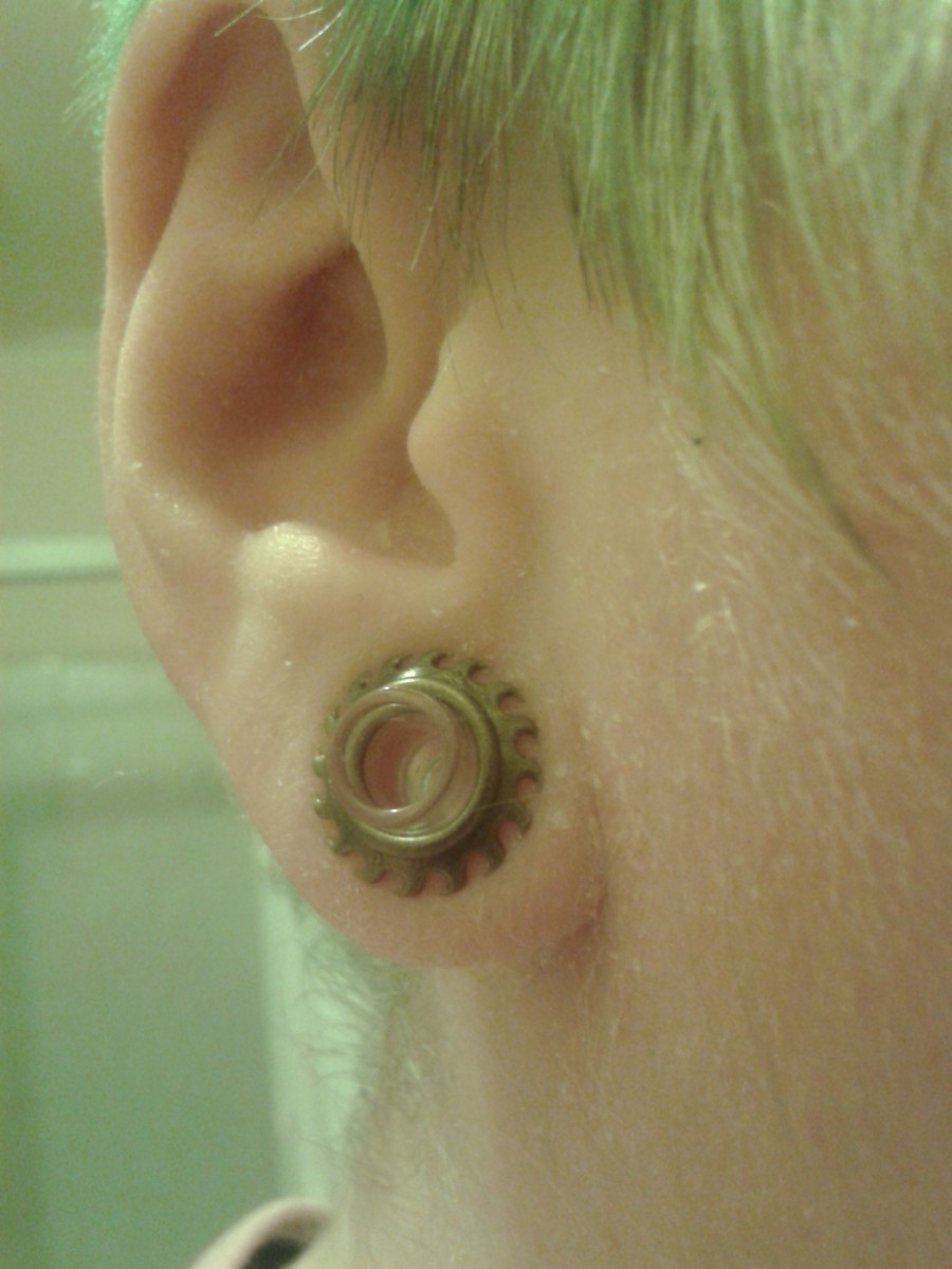 My 0g holes, complete with glass eyelets and sawblade o-rings.