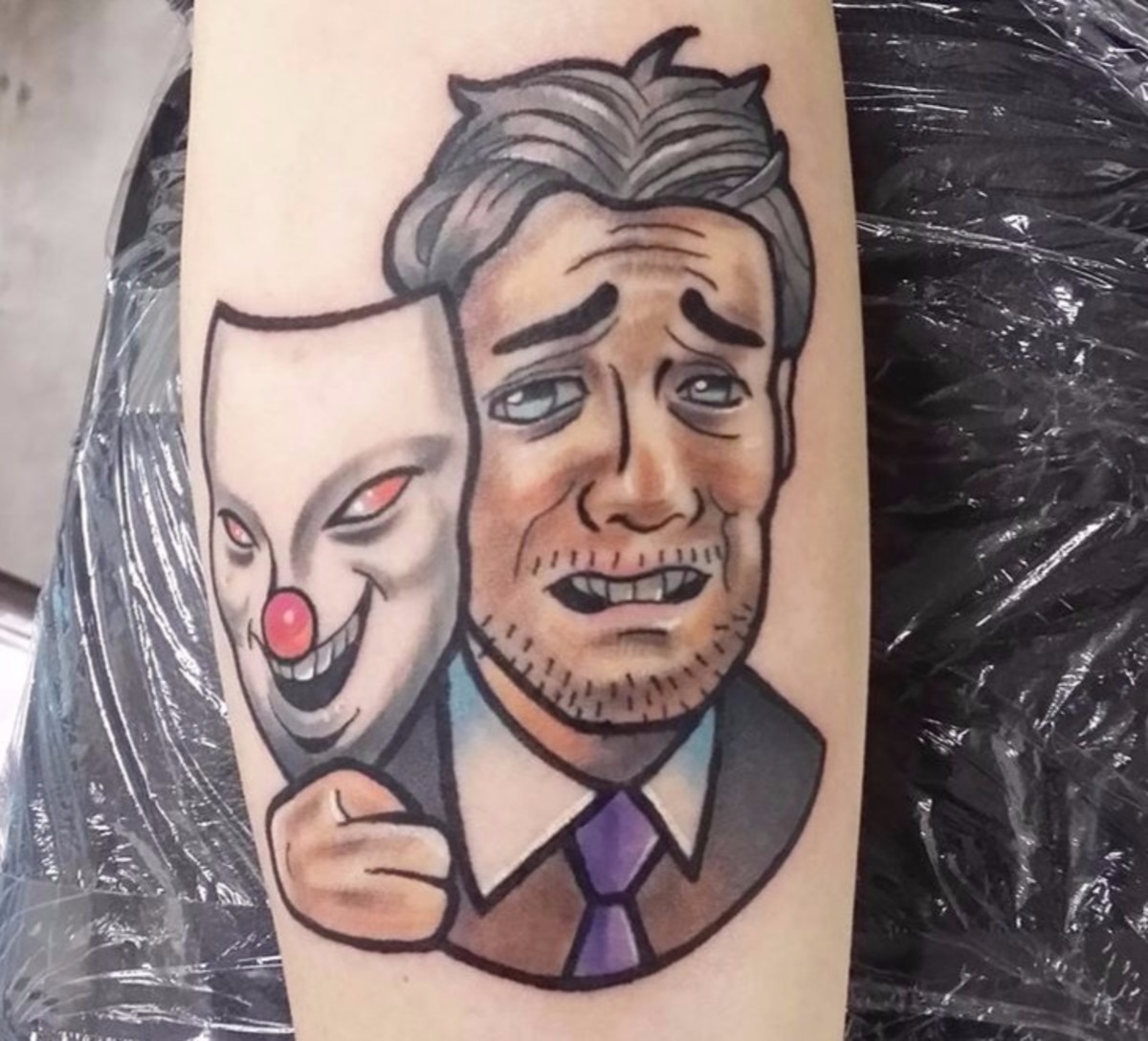 A mask tattoo might reveal the hidden emotions of its wearer.