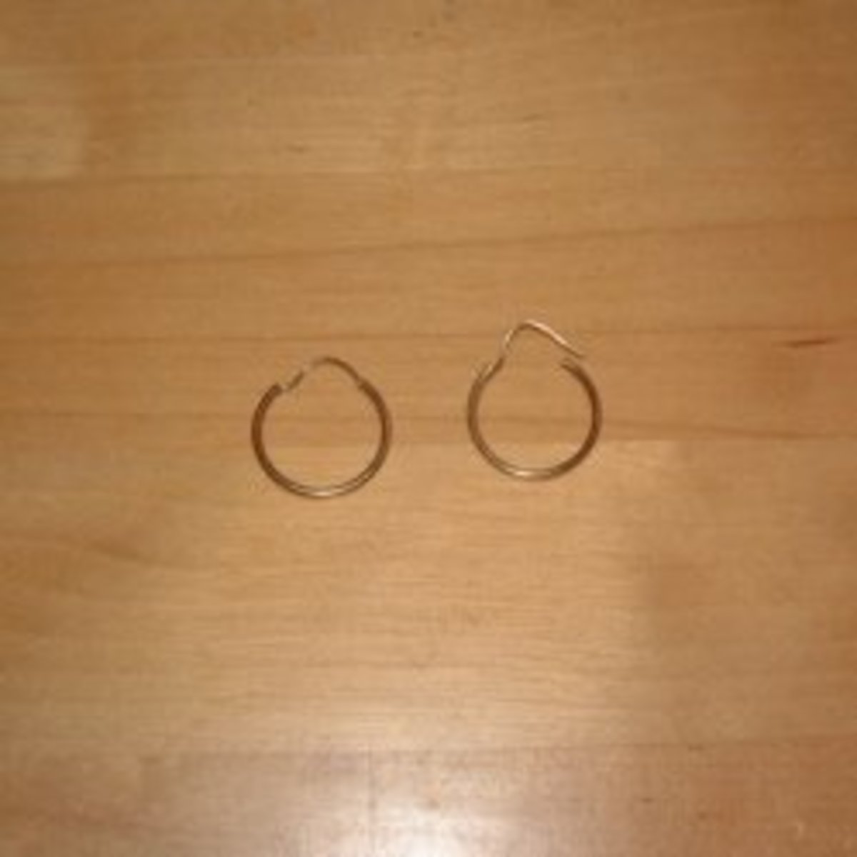 Gold hinged-hoop earrings