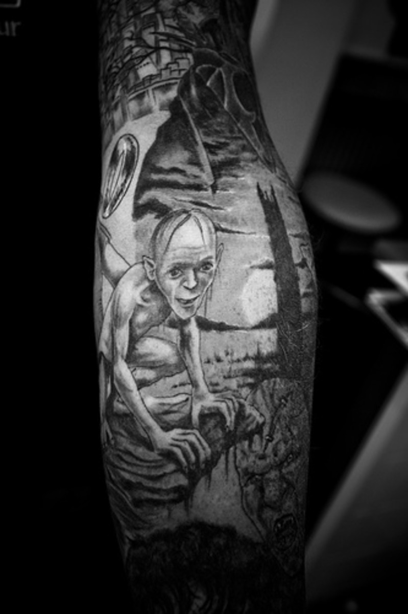 This tattoo is of Gollum in moonlight.