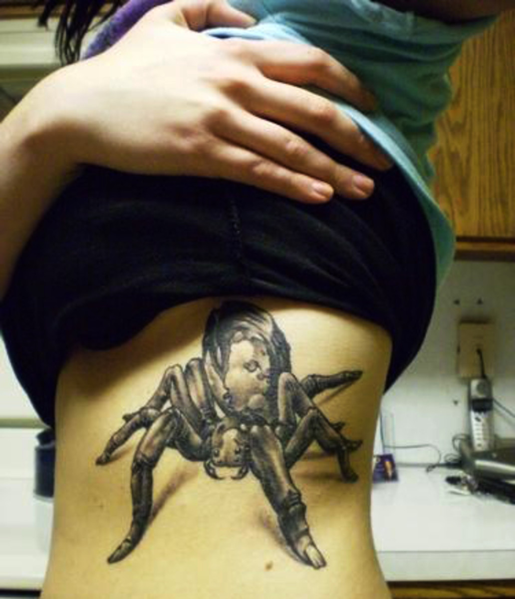 Large Rib Spider Tattoo in Dark Ink