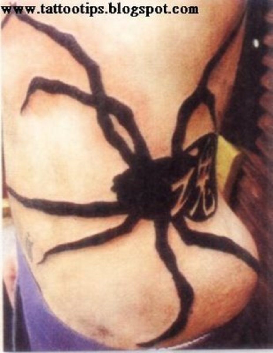 Full side rib spider tattoo.
