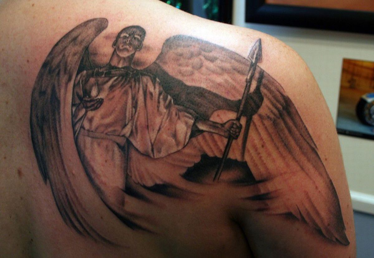Powerful Angel Tattoos - TatRing