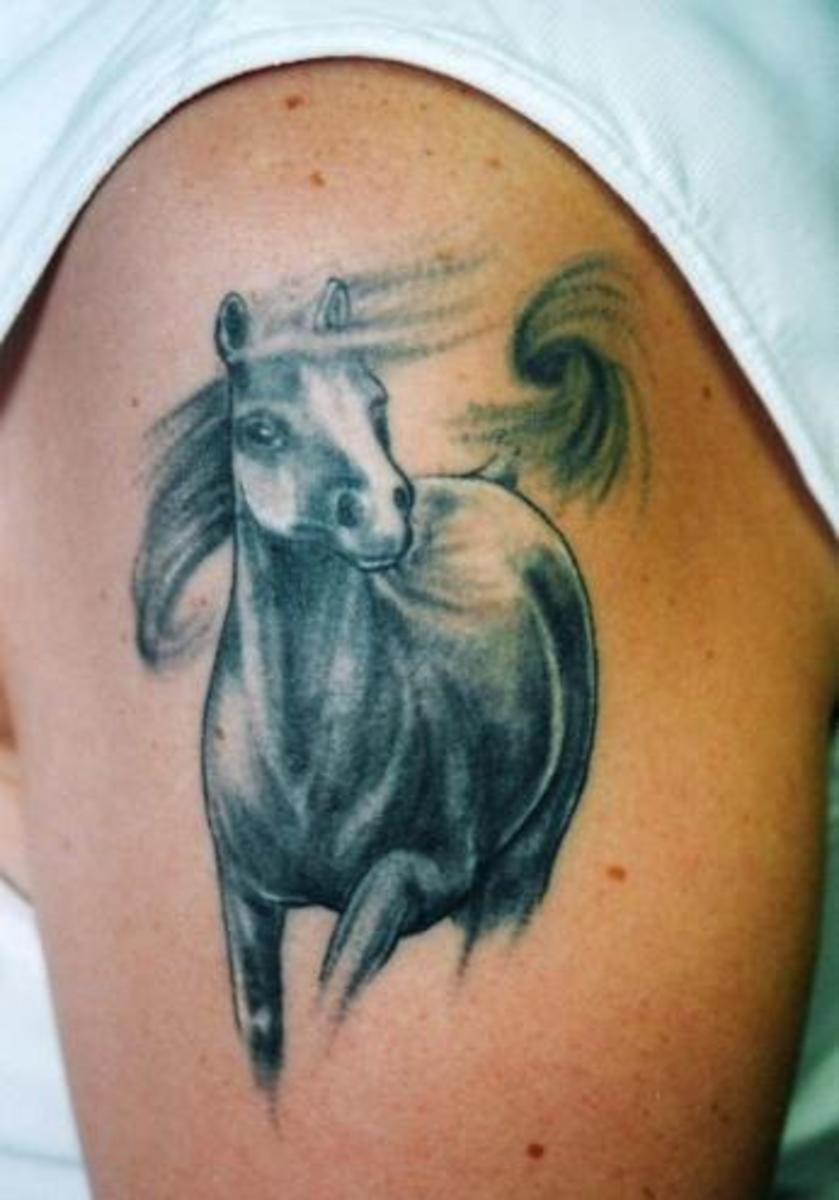 Racing horse tattoo