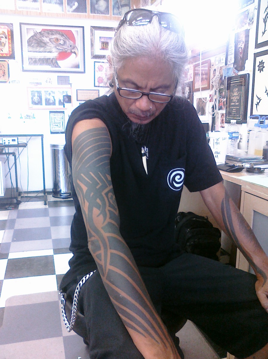 Leo Zulueta, pictured here, helped resurrect the tribal tattoo design.