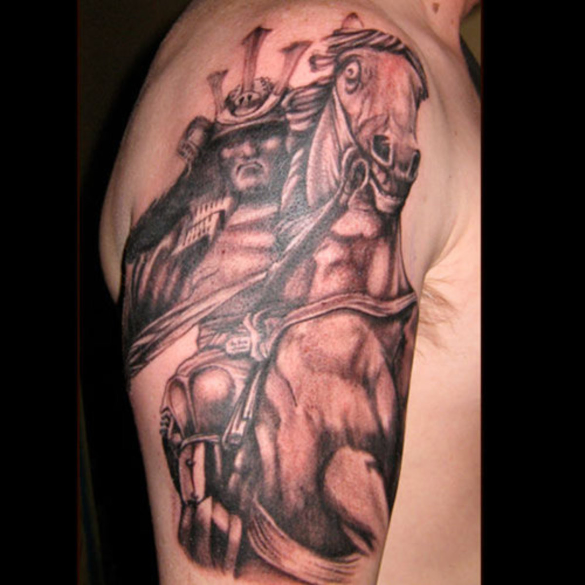 An impressive tattoo of a Samurai warrior on horseback.