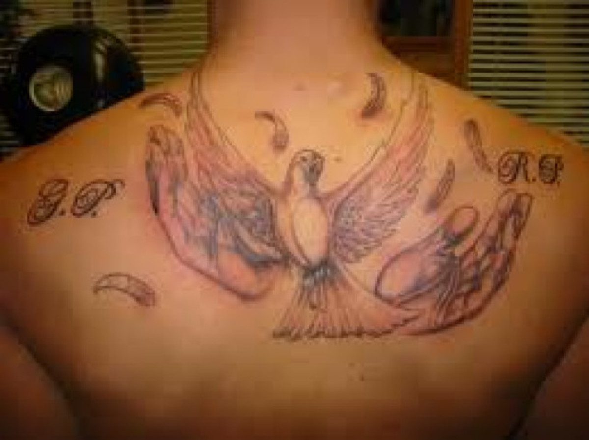 Flying Dove Back Tattoo