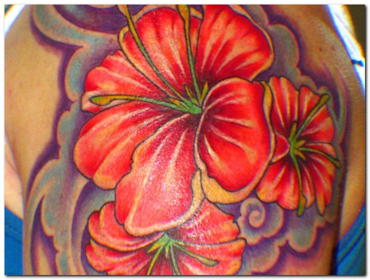 A beautiful but masculine tropical flower design for this half-sleeve 