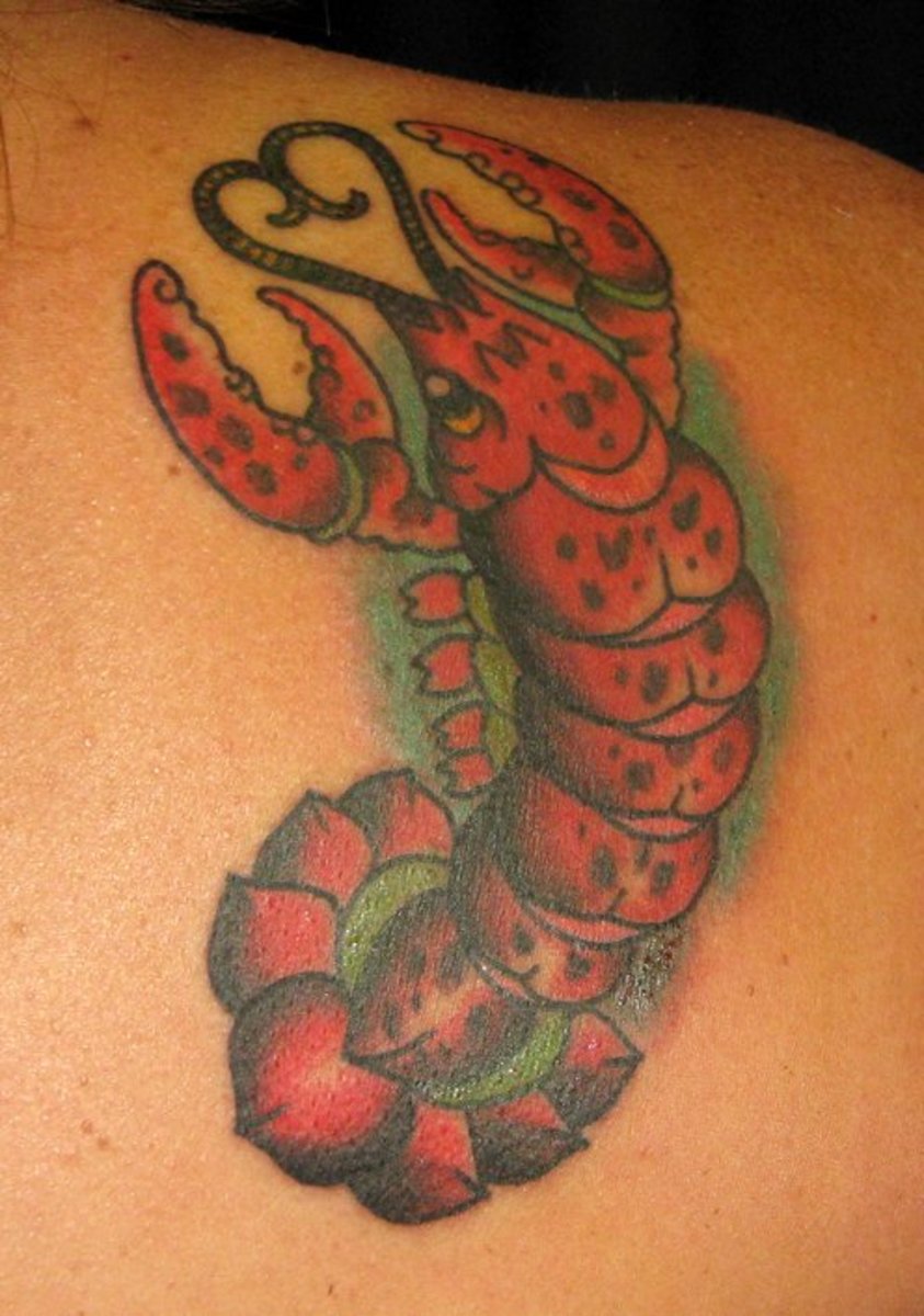 A cartoon-style lobster tattoo.