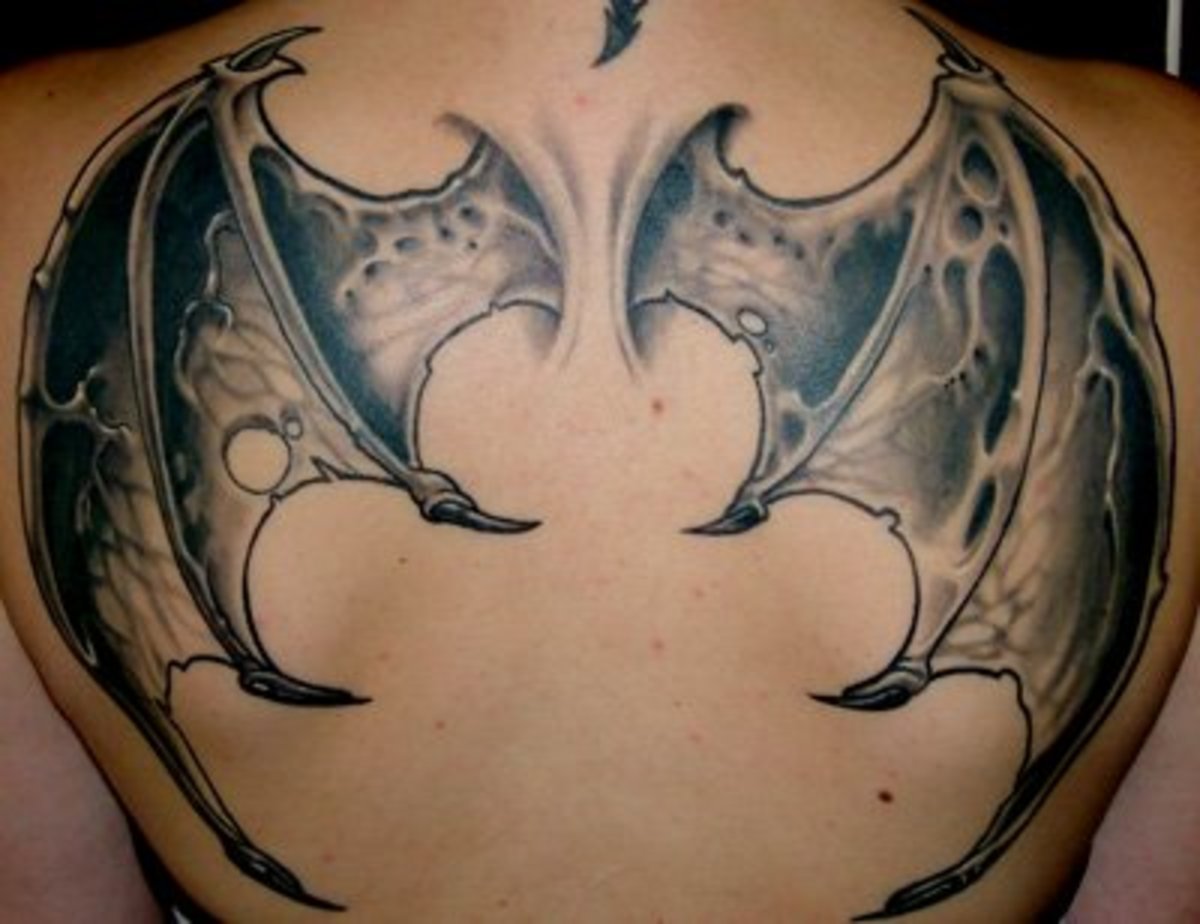 Bat-like wing tattoo
