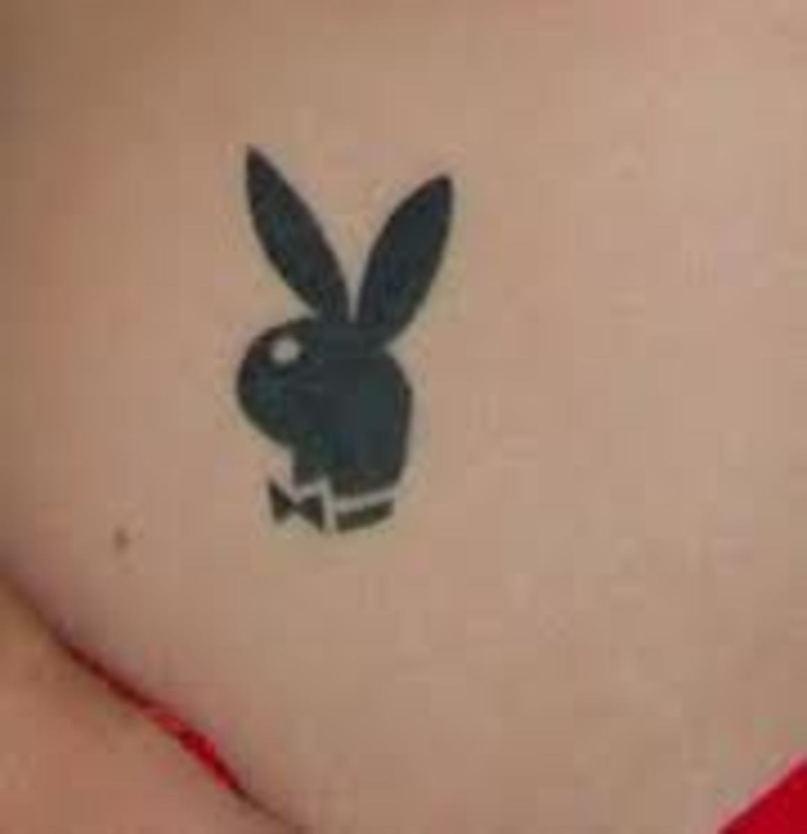 Playboy bunny tattoo on butt