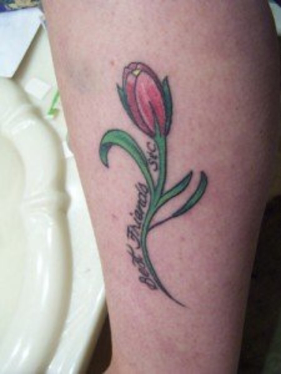 Tulip budding leg tattoo