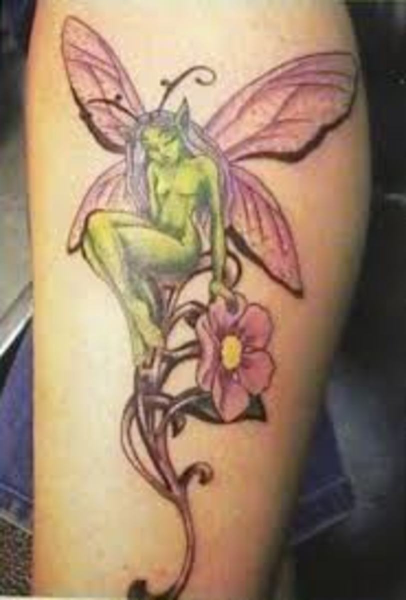 A fairy is seated on the stem of a daisy in this tattoo. A combination of two popular tattoo themes: fairies and daisies.