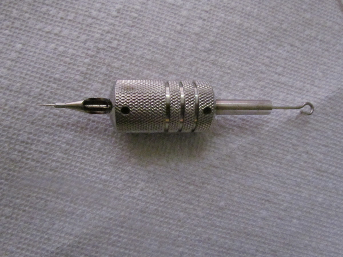 Needle in diamond-tip tube.