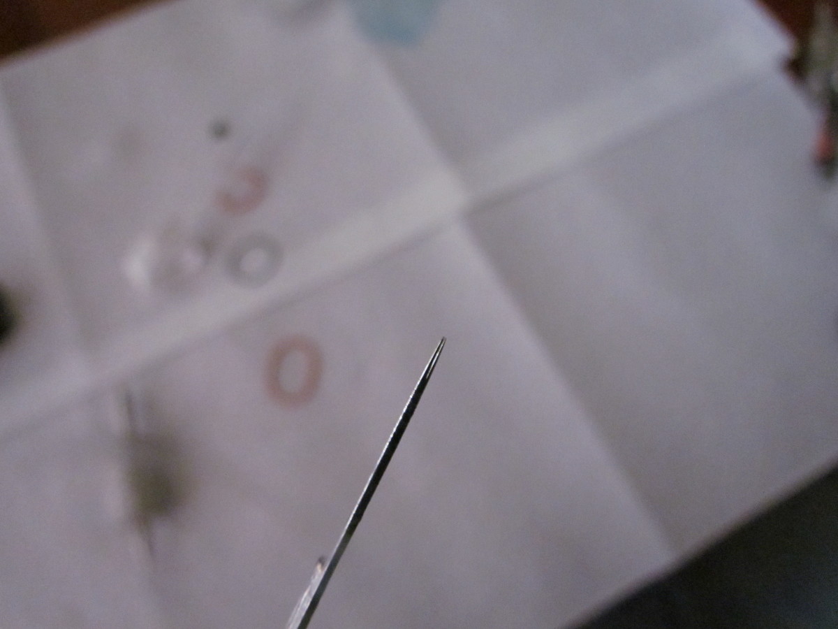 Check your needles' tips for burs or solder.