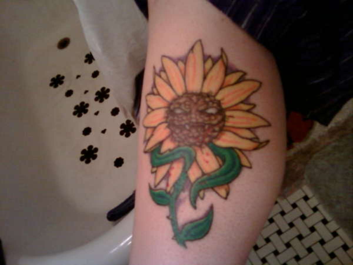 This is an interesting twist on the sunflower tattoo design.