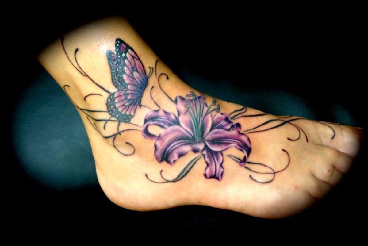 Flower and butterfly foot tattoos