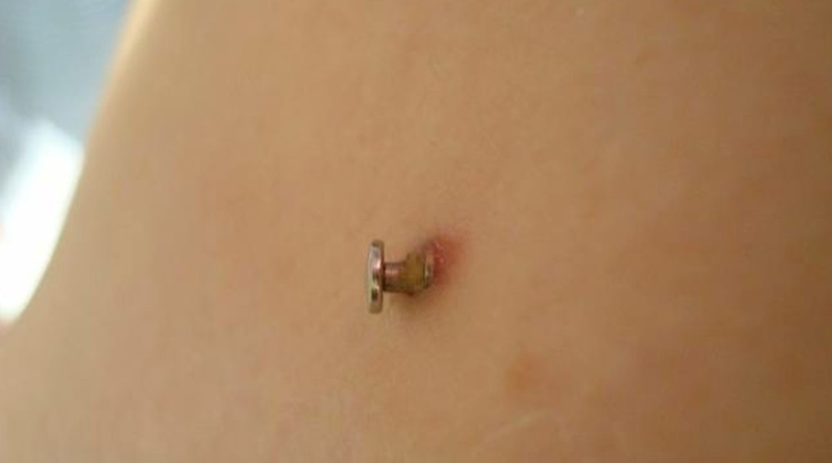 Tattoo and Microdermal piercings by Jen  Chest Rocker with  Flickr