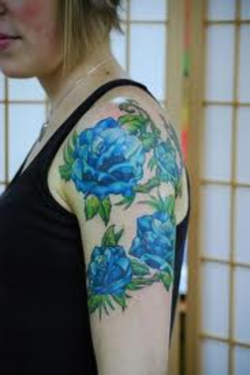 Blue rose tattoos can be designed in a nearly unlimited number of ways.