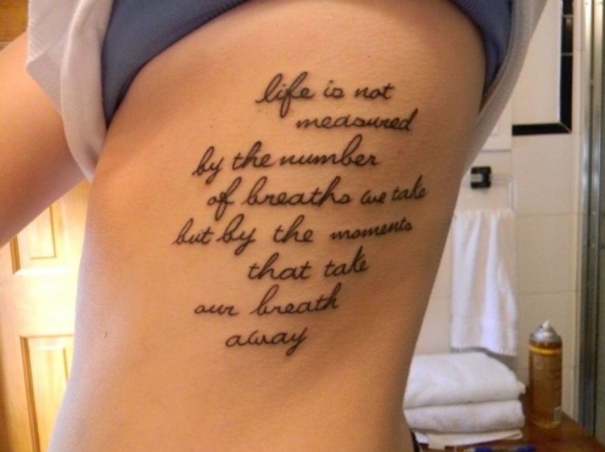 Side quote tattoo on woman