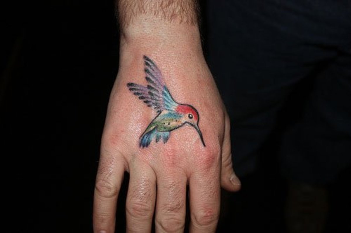 Hummingbird Hand Tattoo