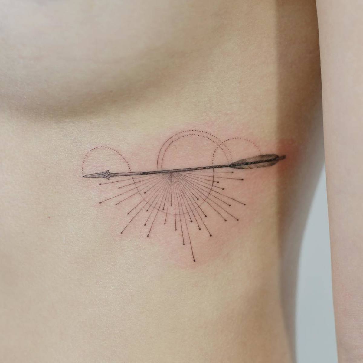 A good tattoo artist can indicate the arrow's movement with ink. (by tattooist_doy)
