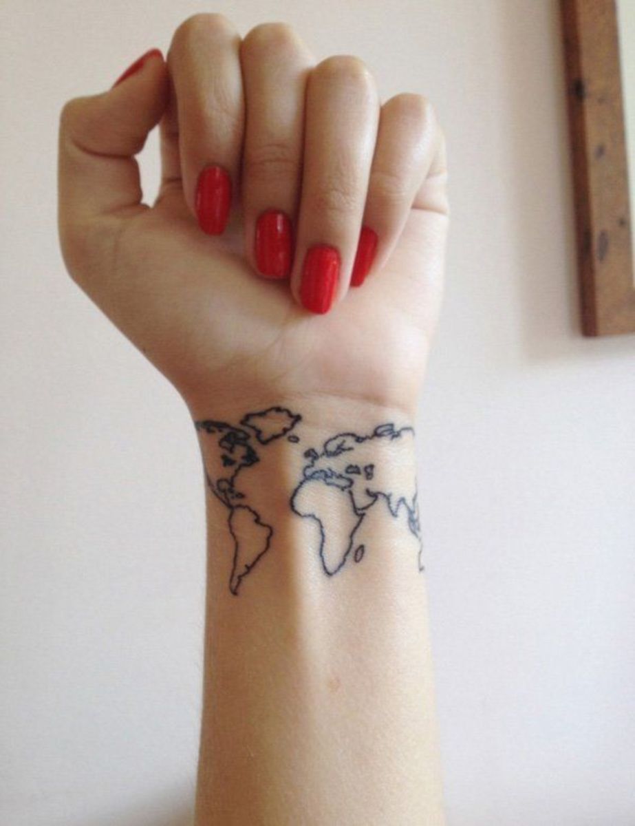27 Of The Best Wrist Tattoos For People Who Love Traveling | YourTango
