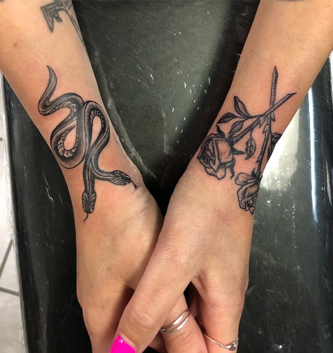 These two wrist tattoos "speak" to one another. 