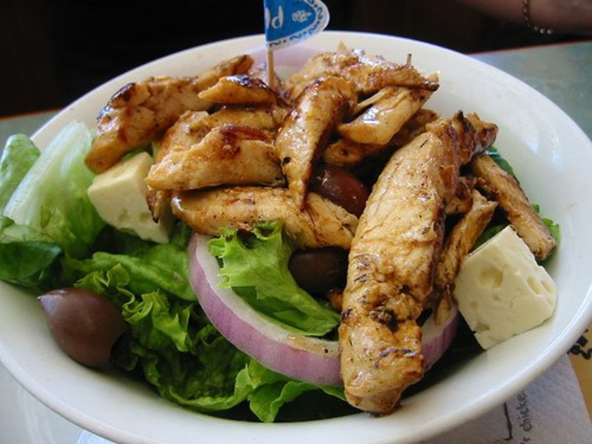 A stylish restaurant-quality meal at home! Grilled chicken on baby green salad with cheese